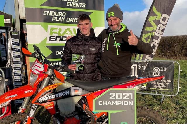 Ethan Marquis, left, wins the RAW Enduro title