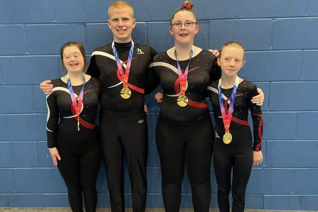 Whitby’s Olivia Harvey, right, was part of the Leeds Espirit team which won the British title in the Disability Teamgym Micro section