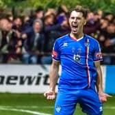 Liam Cooke celebrates scoring for Whitby Town in their 3-0 defeat of derby rivals Scarborough Athletic.

Photo by Brian Murfield