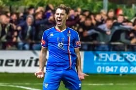 Liam Cooke celebrates scoring for Whitby Town in their 3-0 defeat of derby rivals Scarborough Athletic.

Photo by Brian Murfield
