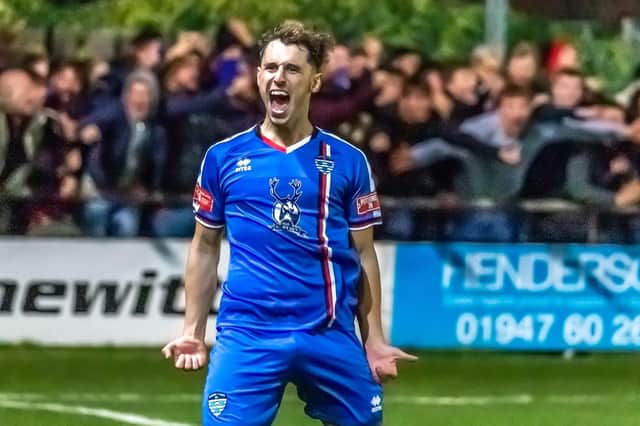 Liam Cooke celebrates scoring for Whitby Town in their 3-0 defeat of derby rivals Scarborough Athletic.
Photo by Brian Murfield