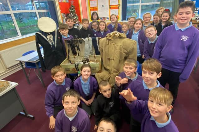 The Year 6 class at Braeburn Primary School are appealing to the public for help in search of the family of a sailor after a mysterious suitcase dating back to the 20th Century was discovered. (Credit: Braeburn Primary and Nursery Academy)
