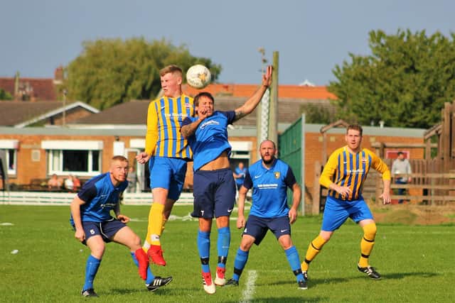 Jensen Bradbury, yellow and blue kit, scored for Seamer in the 6-0 win against Goal Sports.