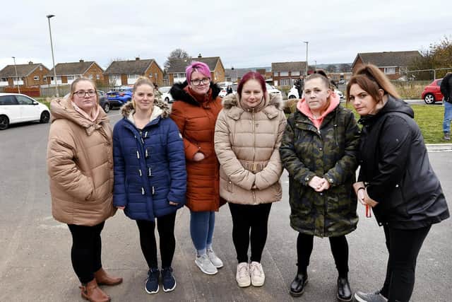 Concerned parents outside the school