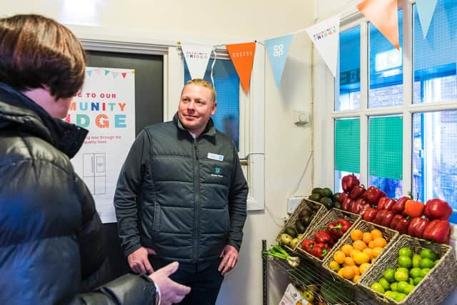 Mark Laker - Member Pioneer for Whitby Co-op at the fridge.