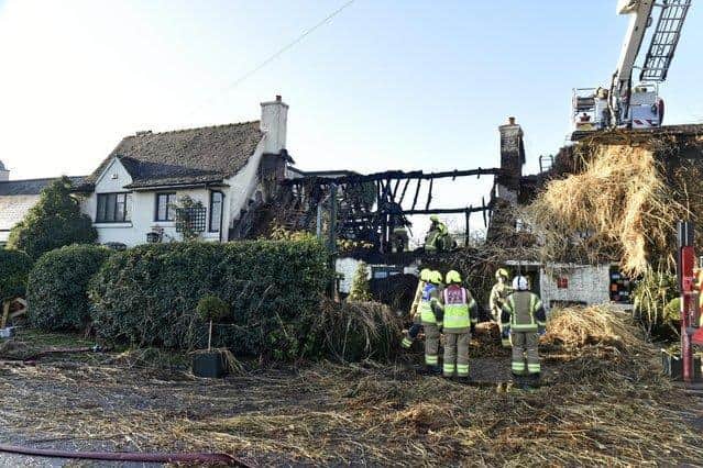 The thatched roof suffered severe damage in the fire.