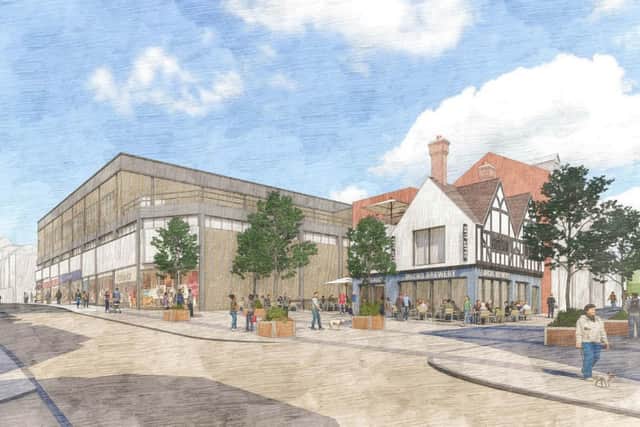 An artist's impression of how the new "public square" will look with the Argos site in the background.