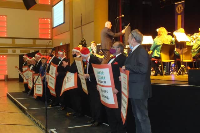Lions with the Twelve Days of Christmas boards – a song which gives a lot of fun to everyone.