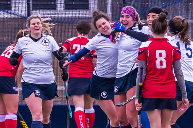 The hosts celebrate a dramatic last-gasp equaliser against leaders Newcastle Uni 3rd to make it 4-4

Photos by Brian Murfield