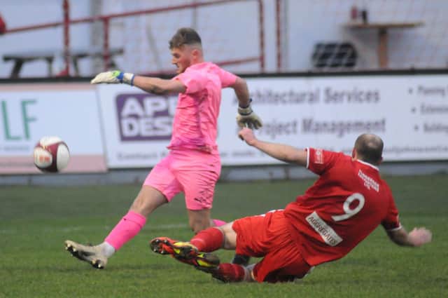 Bridlington Town player-manager Brett Agnew closes down the Yorkshire Amateur keeper
Photo by Dom Taylor available to order by emailing s70dom@gmail.com or on Facebook at DT Sports Photographs