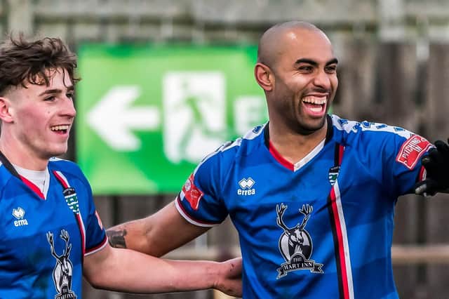 Jacob Hazel, right, celebrates his - and his team's - opening goal as Whitby Town defeated Grantham 3-0

Photos by Brian Murfield