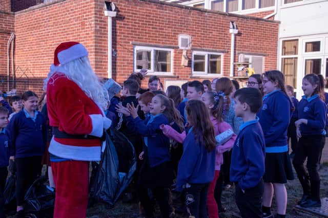 Santa brings early festive cheer to Braeburn Primary School thanks to Anglo American.