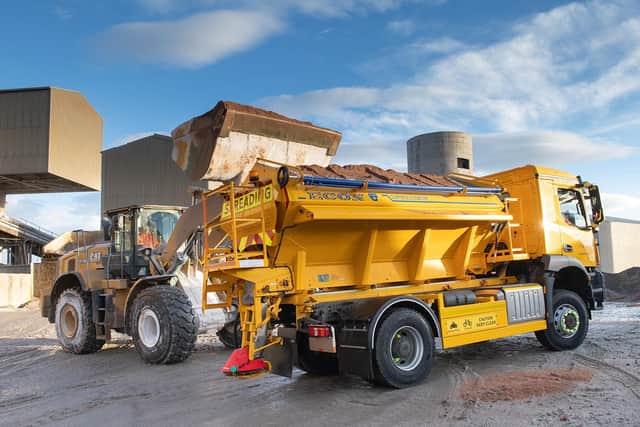 A gritter is loaded with rock salt from Boulby Mine