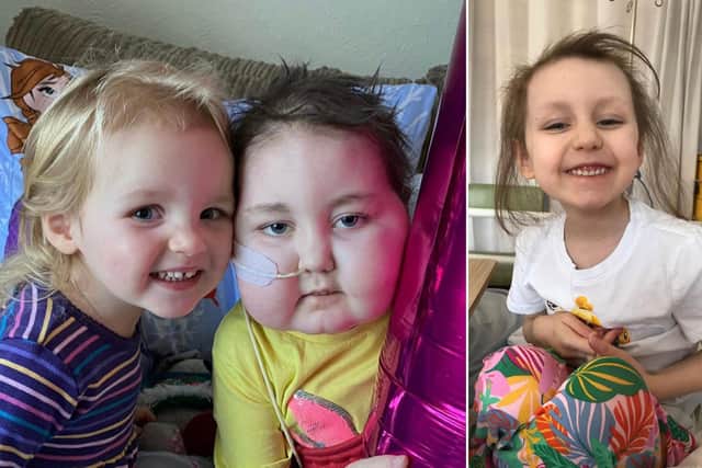 Evie celebrates her seventh birthday at home with younger sister Beatrice, left, and pictured recovering in hospital.