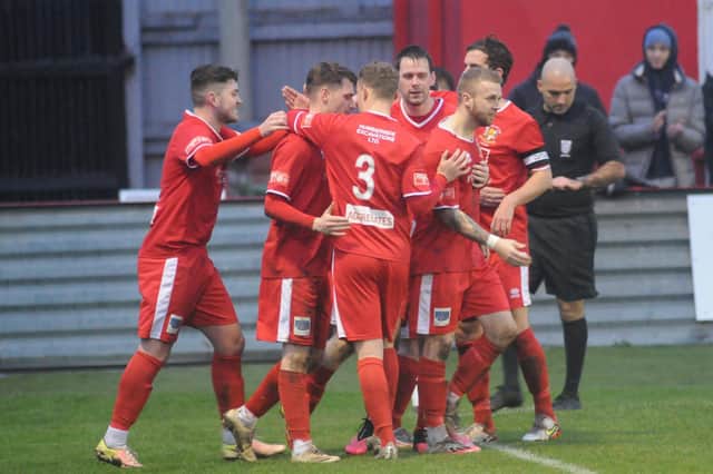 Danny Earl celebrates with team mates after his goal put the Seasiders 2-1 up
Photos by Dom Taylor