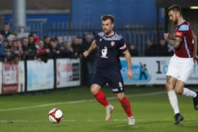 Ryan Watson on the ball for Scarborough Athletic in their New Year's Day 1-0 loss at South Shields.

Photo by Morgan Exley