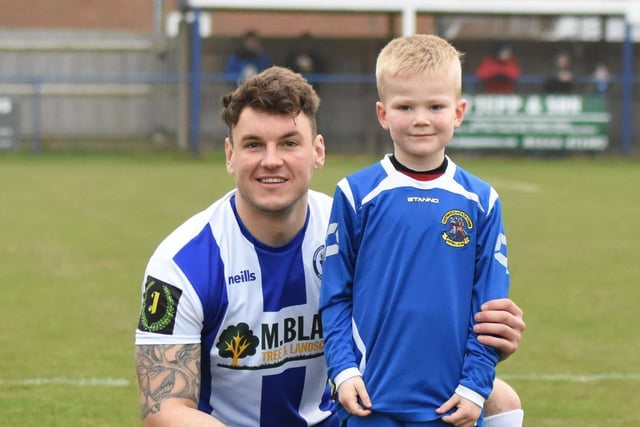 Nathan Cooper with a mascot