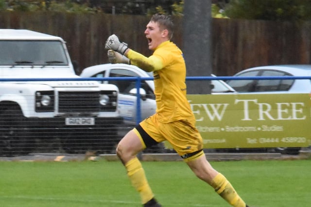 Goalkeeper Luke Glover scored a dramatic winner for Haywards Heath Town in their FA Trophy win over Bracknell Town.