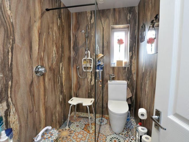 A stylish shower room within the dormer bungalow.