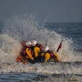 Volunteers from Bridlington RNLI heading out to sea on the inshore lifeboat. - Image: RNLI/Mike Milner