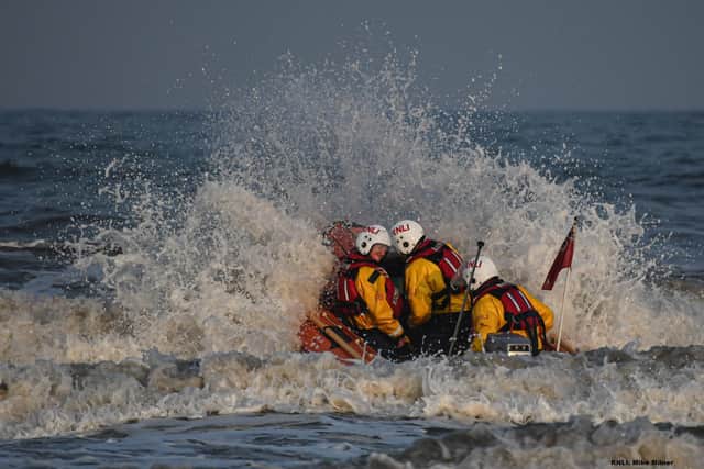 Volunteers from Bridlington RNLI heading out to sea on the inshore lifeboat. - Image: RNLI/Mike Milner