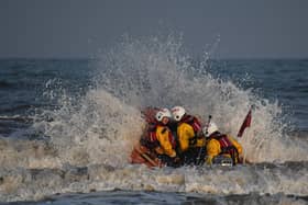 Volunteers from Bridlington RNLI heading out to sea on the inshore lifeboat. - Image: RNLI/Mike Milner