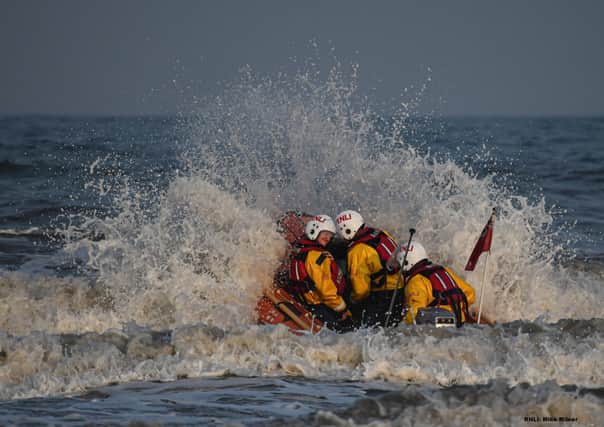 Volunteers from Bridlington RNLI heading out to sea on the inshore lifeboat. - Image: RNLI/Mike Milner