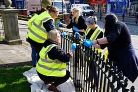 Volunteers paint railings in Scarborough town centre as part of the campaign. More than £200,000 has been committed to a range of improvements across the town.