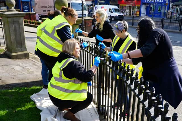 Volunteers paint railings in Scarborough town centre as part of the campaign. More than £200,000 has been committed to a range of improvements across the town.