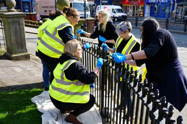 Volunteers paint railings in Scarborough town centre as part of the campaign. More than £200,000 has been committed to a range of improvements across the town.