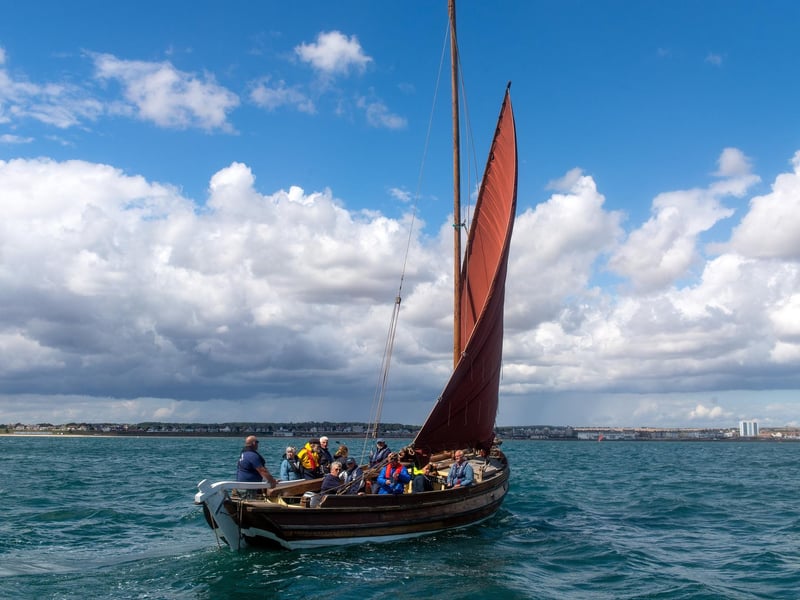 Skipper Chris Traves and Stewart McKie under control of the sail of Imperialist.