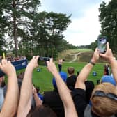 Spectators take photographs with their mobile phones (Photo by Luke Walker/Getty Images)