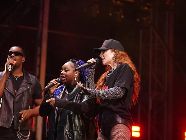 Pop sensation Jess Glynne performing on stage.