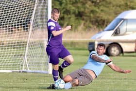 Brid Rovers Millau slide in for a challenge during their 4-2 friendly loss against Brid Spa. PHOTOS BY TCF PHOTOGRAPHY