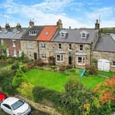 The five-bedroom property, with two-storey byre attached.