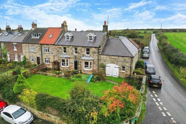 The five-bedroom property, with two-storey byre attached.