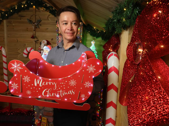 Store manager Chris Golder in Santa's Grotto.