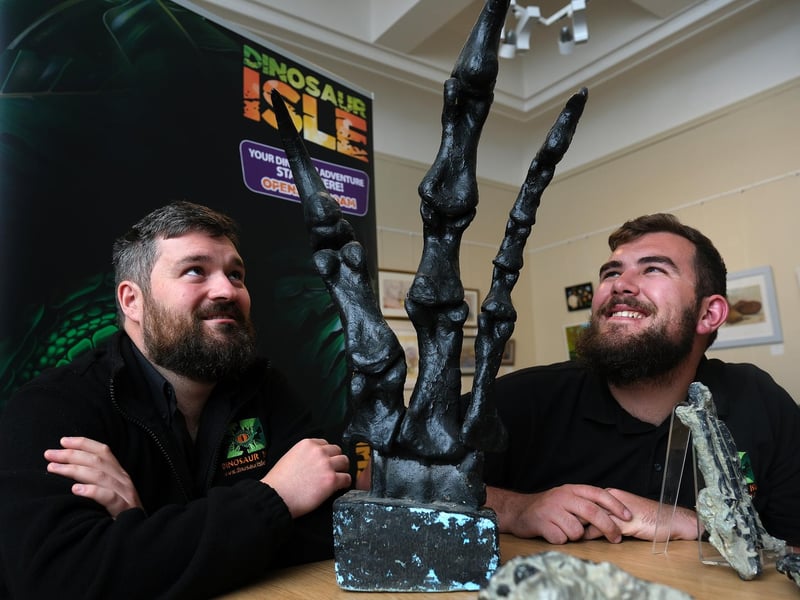 Dinosaur Isle at Pannett Park with Simon Penn and Harry McDade and a Spinosaurus foot.
picture: Richard Ponter.
