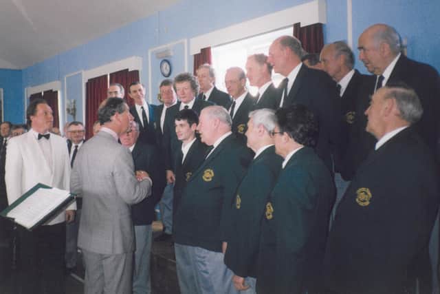 King Charles - then, the Prince of Wales - meets the Dalesmen Singers in 1998.