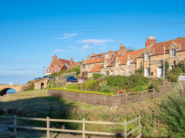 The row of cottages were originally part of the Mulgrave Estate.