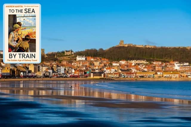 The front cover of To The Sea by Train with background picture of Scarborough seafront by James Hardisty.