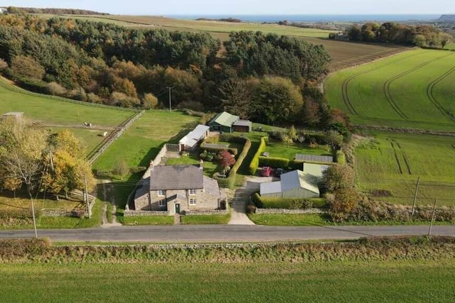 An aerial view of the property in its stunning rural location.