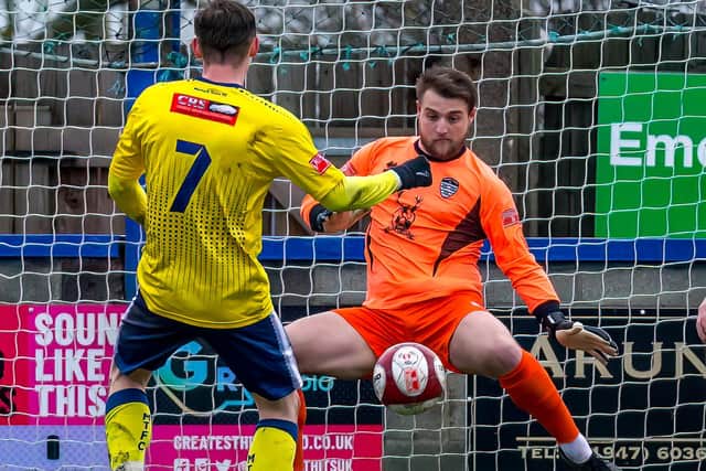 Whitby Town goalkeeper Shane Bland, pictured earlier this season against Matlock last month, pulled off some superb saves as his side drew at Hyde United.