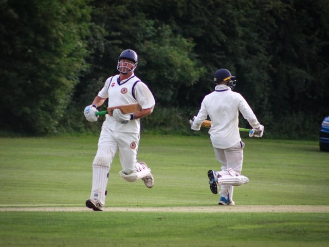 Ebberston 2nds batters scamper through for a run.