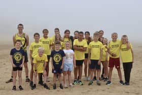 The junior athletes line up for the Eddie Knapp Challenge race at the beach. PHOTOS BY TCF PHOTOGRAPHY