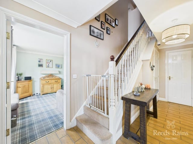 The hallway, with staircase leading up.