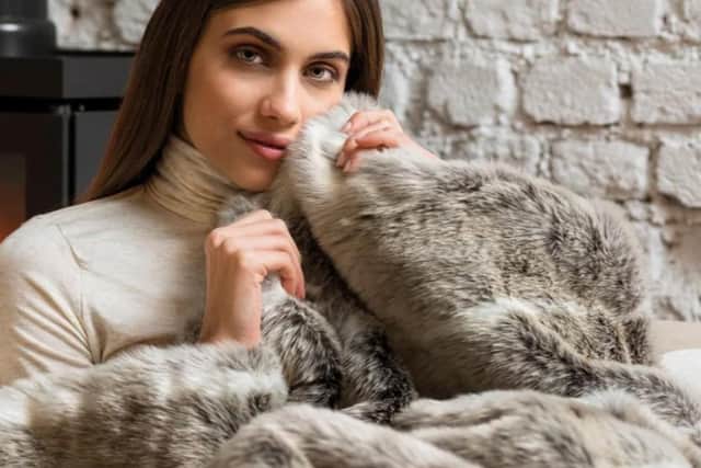 Hygge Days Alaskan Husky faux fur heated throw.
