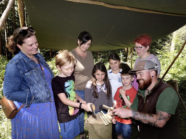 Woodland Manager Rob Weatherley with visitors at the wood.