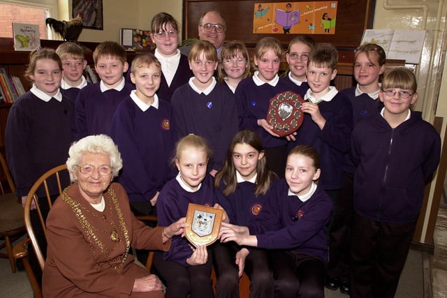 The Mayor of Doncaster, Councillor Margaret Robinson, and Ian Hodgson, of RHM Frozen Foods, have presented plaques to pupils at Carcroft Primary School, who had 100 per cent attendance. Our picture shows them with the award winning pupils, including, seated, front, Natalie Coaten, aged 11, Hannah Moss, aged ten, and Rachael Morris.