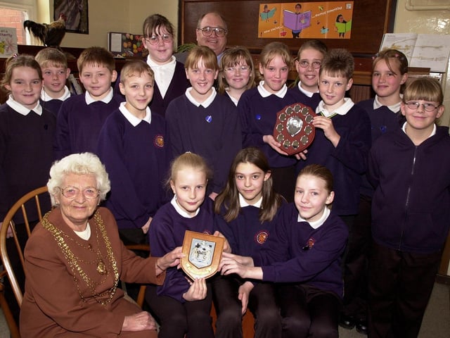 The Mayor of Doncaster, Councillor Margaret Robinson, and Ian Hodgson, of RHM Frozen Foods, have presented plaques to pupils at Carcroft Primary School, who had 100 per cent attendance. Our picture shows them with the award winning pupils, including, seated, front, Natalie Coaten, aged 11, Hannah Moss, aged ten, and Rachael Morris.